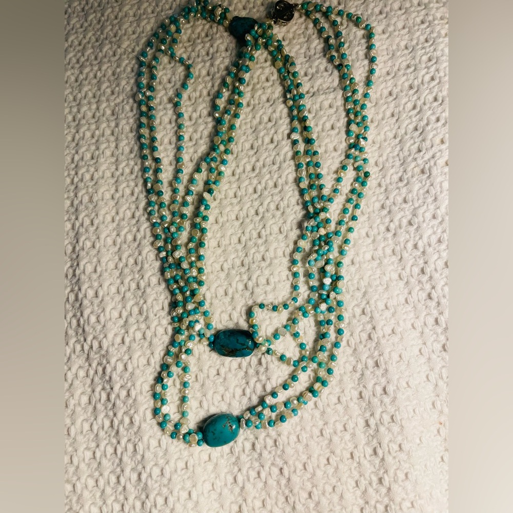 Turquoise beaded necklace.